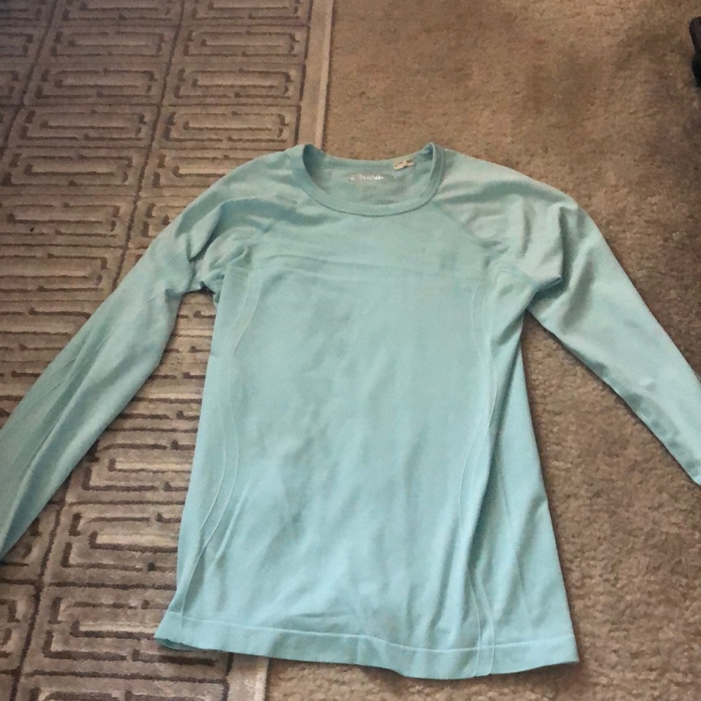 blue long sleeve workout top